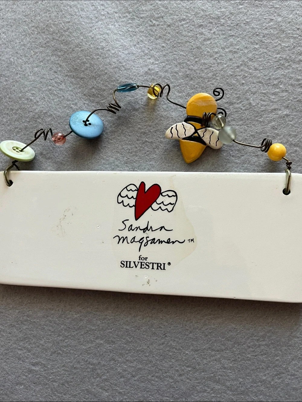 Silvestri Turquoise Ceramic Wall Plaque with Yellow Bee Accent